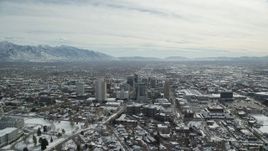 5.5K aerial stock footage orbit Downtown Salt Lake City and reveal Utah State Capitol with winter snow Aerial Stock Footage | AX126_015