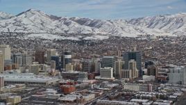 5.5K aerial stock footage orbit west side of Downtown Salt Lake City with winter snow, Utah Aerial Stock Footage | AX126_028E