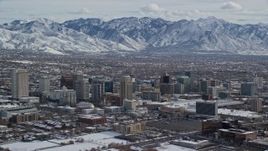 5.5K aerial stock footage of orbiting Salt Lake City's downtown area with winter snow in Utah Aerial Stock Footage | AX126_032E