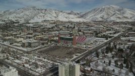 5.5K aerial stock footage approach Rice-Eccles Stadium at the University of Utah in winter, Salt Lake City Aerial Stock Footage | AX126_048
