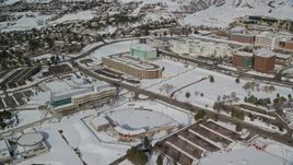 5.5K aerial stock footage orbit baseball field and campus buildings with snow at University of Utah, Salt Lake City Aerial Stock Footage | AX126_051