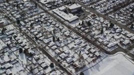 5.5K aerial stock footage of a bird's eye view of homes with snow in Salt Lake City, Utah, in wintertime Aerial Stock Footage | AX126_064