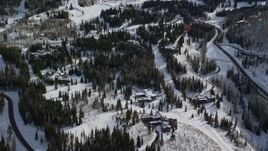 5.5K aerial stock footage fly over mountainside mansions with winter snow in Park City, Utah Aerial Stock Footage | AX126_119