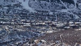 5.5K aerial stock footage flyby the center of the small town of Park City in winter, Utah Aerial Stock Footage | AX126_148E