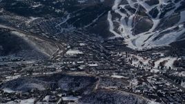 5.5K aerial stock footage of small Utah mountain town with winter snow, Park City Aerial Stock Footage | AX126_158