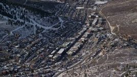 5.5K aerial stock footage orbiting the town center of Park City with wintertime snow, Utah Aerial Stock Footage | AX126_171E