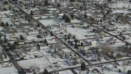 5.5K aerial stock footage fly over a small town neighborhood with snow on the ground in Midway, Utah Aerial Stock Footage | AX126_209