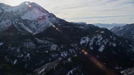 5.5K aerial stock footage of north side of Mount Timpanogos with wintertime snow, Utah Aerial Stock Footage | AX126_282E