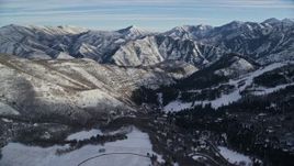 5.5K aerial stock footage approach distant snow mountains while flying over Sundance, Utah Aerial Stock Footage | AX126_296E