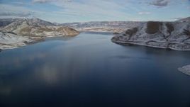 5.5K aerial stock footage approach Heber City while flying over Deer Creek Reservoir in winter, Utah Aerial Stock Footage | AX126_310E