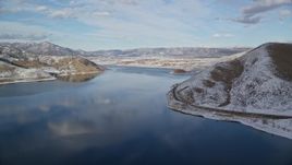 5.5K aerial stock footage approach Heber City from Deer Creek Reservoir in wintertime, Utah Aerial Stock Footage | AX126_312