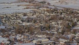 5.5K aerial stock footage orbit small town residential neighborhoods with winter snow, Heber City, Utah Aerial Stock Footage | AX127_005