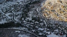 5.5K aerial stock footage approach hillside homes with winter snow at sunset, Park City, Utah Aerial Stock Footage | AX127_039E