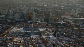 5.5K aerial stock footage orbit Utah State Capitol and downtown with winter snow at sunset, Salt Lake City Aerial Stock Footage | AX127_090E