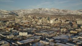 5.5K aerial stock footage orbit Downtown Salt Lake City with snow at sunset in wintertime, Utah Aerial Stock Footage | AX127_099