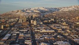 5.5K aerial stock footage approach Main and State Streets through Downtown Salt Lake City, Utah, sunset in winter Aerial Stock Footage | AX127_133E