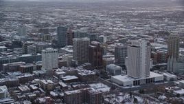 5.5K aerial stock footage orbit and approach buildings in Downtown Salt Lake City at sunset in winter, Utah Aerial Stock Footage | AX127_165