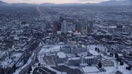 5.5K aerial stock footage orbit Utah State Capitol and Downtown SLC with winter snow at twilight Aerial Stock Footage | AX128_008