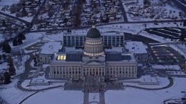 5.5K aerial stock footage orbit front of Utah State Capitol with winter snow at twilight, Salt Lake City Aerial Stock Footage | AX128_010E