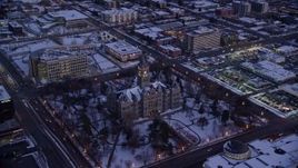 5.5K aerial stock footage of Salt Lake City Hall with winter snow at twilight, Utah Aerial Stock Footage | AX128_027E