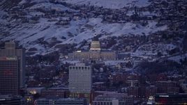 5.5K aerial stock footage orbit Utah Capitol Building with winter snow seen from Downtown Salt Lake City at twilight Aerial Stock Footage | AX128_035
