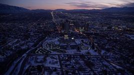 5.5K aerial stock footage of circling north of the Utah State Capitol building and Downtown Salt Lake City with winter snow at twilight Aerial Stock Footage | AX128_050E
