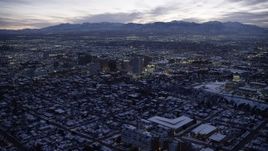5.5K aerial stock footage orbit Downtown Salt Lake City, Utah, and the capitol with winter snow at twilight Aerial Stock Footage | AX128_054