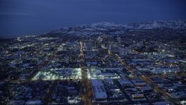 5.5K aerial stock footage fly over West Temple toward State Street, Downtown SLC, Utah with winter snow at night Aerial Stock Footage | AX128_070