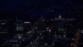 5.5K aerial stock footage of Utah State Capitol on the north end of Downtown Salt Lake City with winter snow at night Aerial Stock Footage | AX128_098E