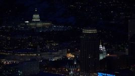 5.5K aerial stock footage orbit the Utah State Capitol and Salt Lake Temple at night in winter, Downtown Salt Lake City, Utah Aerial Stock Footage | AX128_103