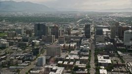 5.5K stock footage video pass city buildings and streets, Downtown Salt Lake City, Utah Aerial Stock Footage | AX129_011E