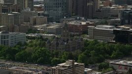 5.5K aerial stock footage of flying by Salt Lake City Hall, Downtown Salt Lake City, Utah Aerial Stock Footage | AX129_013