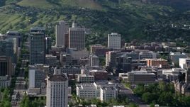 5.5K aerial stock footage of flying by State Street, Main Street, city buildings, Downtown Salt Lake City, Utah Aerial Stock Footage | AX129_015
