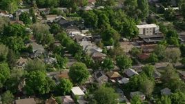 5.5K aerial stock footage of flying by suburban residential neighborhood, Salt Lake City, Utah Aerial Stock Footage | AX129_023