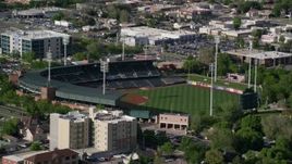 5.5K stock footage video of circling Spring Mobile Ballpark during a game, Salt Lake City, Utah Aerial Stock Footage | AX129_028