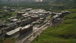 5.5K aerial stock footage of passing the University of Utah Hospital buildings, Salt Lake City, Utah Aerial Stock Footage | AX129_073E
