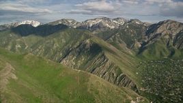 5.5K aerial stock footage of flying by the Wasatch Range, Utah Aerial Stock Footage | AX129_090E