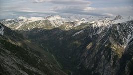 5.5K aerial stock footage of the snow-capped peaks of the Wasatch Range, Utah Aerial Stock Footage | AX129_108E