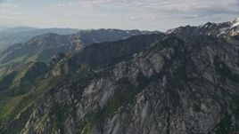 5.5K aerial stock footage of an approach to mountain ridges, Wasatch Range, Utah Aerial Stock Footage | AX129_127E