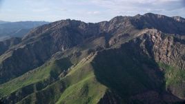 5.5K aerial stock footage of passing by Mount Olympus in the Wasatch Range, Mount Olympus, Utah Aerial Stock Footage | AX129_134