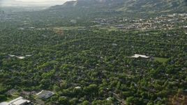 5.5K aerial stock footage fly over suburbs, approach University of Utah sports fields, Salt Lake City, Utah Aerial Stock Footage | AX129_140E