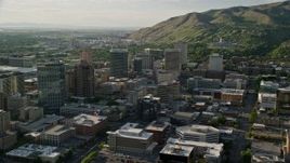 5.5K aerial stock footage of city buildings, convention center, Utah State Capitol, Downtown Salt Lake City, Utah Aerial Stock Footage | AX129_146E