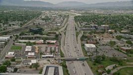 5.5K aerial stock footage of flying over I-15 and passing homes, Salt Lake City, Utah Aerial Stock Footage | AX130_017E