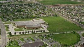 5.5K aerial stock footage of orbiting West Hills Middle School and grass fields, West Jordan, Utah Aerial Stock Footage | AX130_026E
