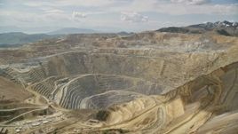 5.5K aerial stock footage of Bingham Canyon Mine (Kennecott Copper Mine), Utah Aerial Stock Footage | AX130_040E