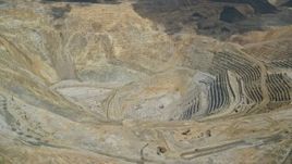 5.5K aerial stock footage of a view of the bottom of Bingham Canyon Mine (Kennecott Copper Mine), Utah Aerial Stock Footage | AX130_052E