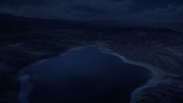 4K day for night color corrected aerial footage fly over the Gunnison Reservoir, low water, approach farms, Sterling, Utah Aerial Stock Footage | AX130_154_DFN