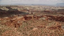 5.5K aerial stock footage of flying by canyons and mesas, Capitol Reef National Park, Utah Aerial Stock Footage | AX130_259E
