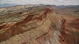 5.5K aerial stock footage of approaching side of a mesa, Capitol Reef National Park, Utah Aerial Stock Footage | AX130_268E