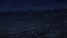 4K day for night color corrected aerial footage approach the Waterpocket Fold rock formations, Capitol Reef National Park, Utah Aerial Stock Footage | AX130_300_DFN